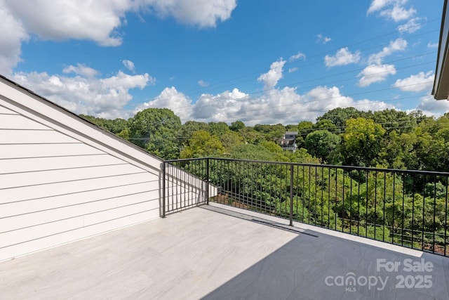 view of patio / terrace featuring a balcony