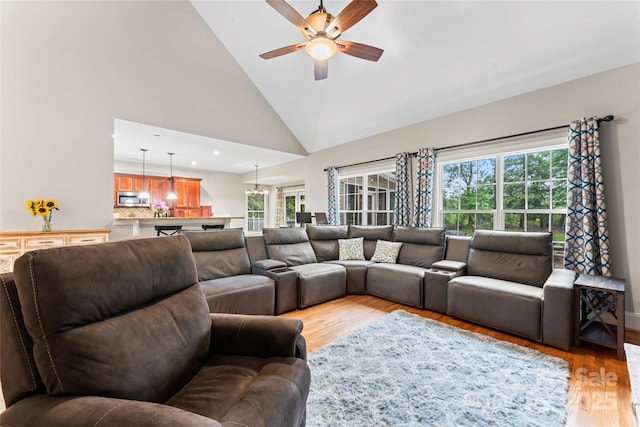 4858 Sagittarius Cir, Denver, NC 28037 - living area with light wood-style floors, ceiling fan, a chandelier, high vaulted ceiling, and recessed lighting
