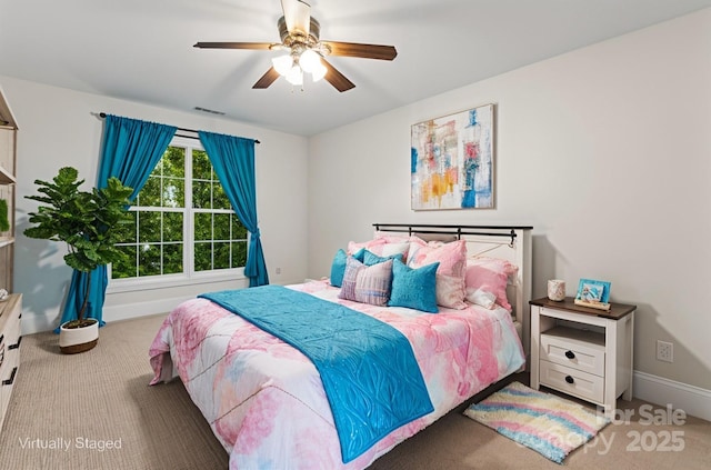 4858 Sagittarius Cir, Denver, NC 28037 - bedroom with carpet, baseboards, and ceiling fan