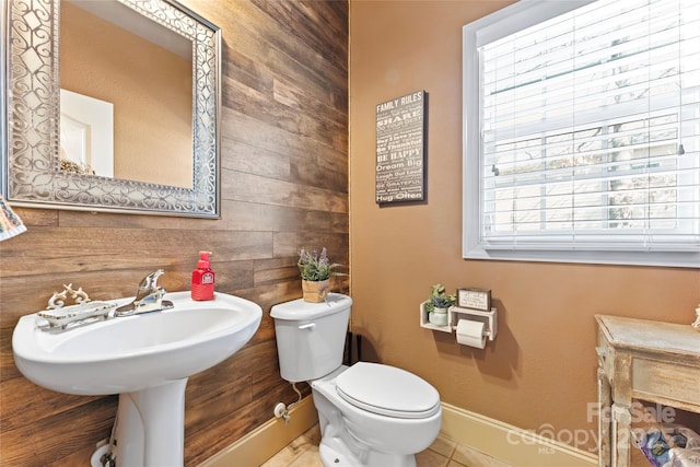 4858 Sagittarius Cir, Denver, NC 28037 - bathroom with wooden walls, toilet, tile patterned flooring, and baseboards