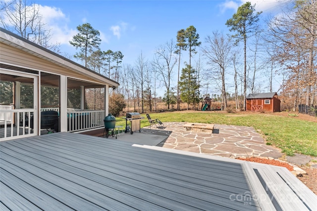 4858 Sagittarius Cir, Denver, NC 28037 - wooden deck with a sunroom, a playground, a storage shed, a patio, and a yard