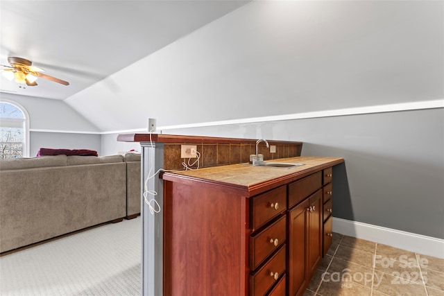 4858 Sagittarius Cir, Denver, NC 28037 - bathroom with a sink, vaulted ceiling, ceiling fan, baseboards, and tile patterned floors