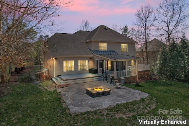 4858 Sagittarius Cir, Denver, NC 28037 - back of house featuring a fire pit, a patio, a sunroom, and a wooden deck