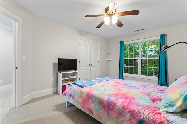 4858 Sagittarius Cir, Denver, NC 28037 - bedroom with baseboards, carpet, ceiling fan, and a closet