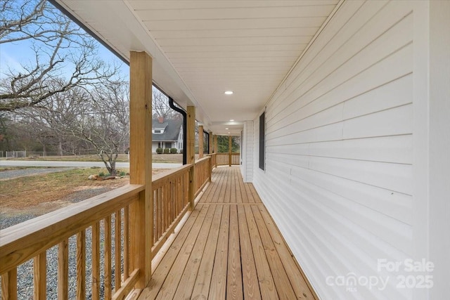 wooden terrace with covered porch