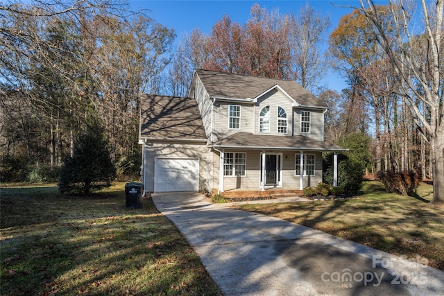 view of front of home featuring a garage, covered porch, concrete driveway, and a front yard