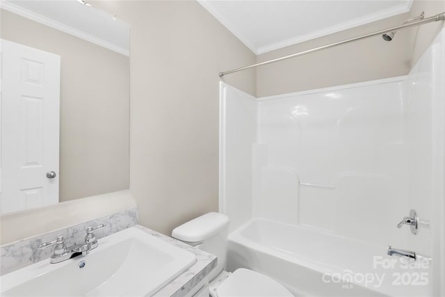 full bath featuring bathing tub / shower combination, vanity, toilet, and crown molding