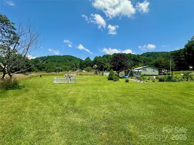 122 Church Hollow Rd, Boone, NC 28607 - view of green lawn with a wooded view