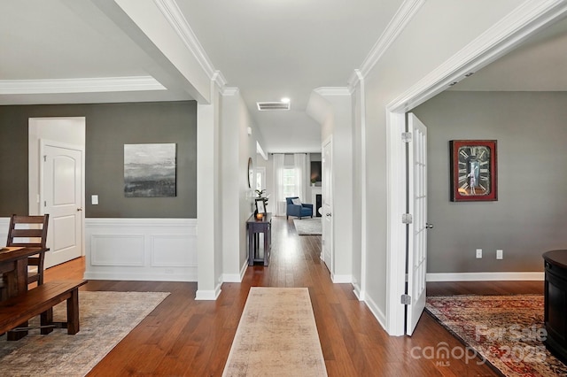 5140 Oak Grove Pl, Waxhaw, NC 28173 - foyer entrance with ornamental molding, baseboards, dark wood finished floors, and visible vents