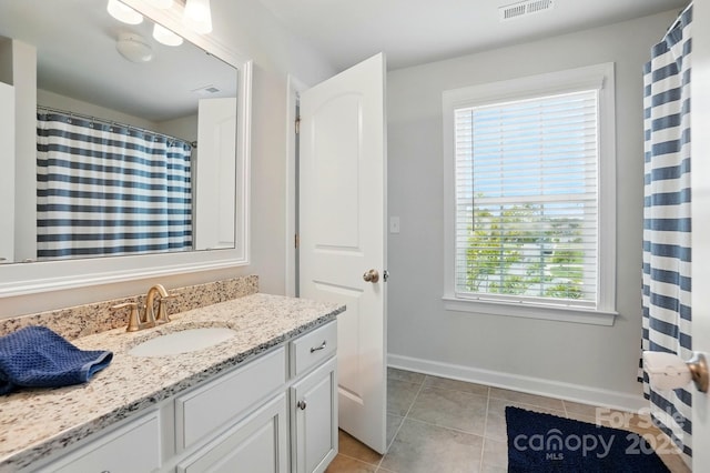 5140 Oak Grove Pl, Waxhaw, NC 28173 - bathroom featuring vanity, baseboards, tile patterned flooring, and visible vents