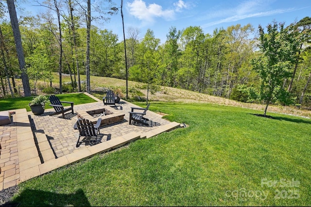 5140 Oak Grove Pl, Waxhaw, NC 28173 - view of yard with a patio area, a view of trees, and an outdoor fire pit