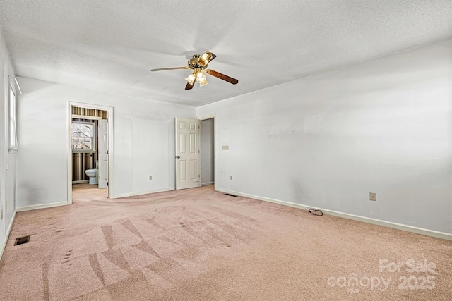 2 Honeysuckle Way, Granite Falls, NC 28630 - unfurnished bedroom featuring baseboards, carpet floors, a textured ceiling, ensuite bath, and ceiling fan