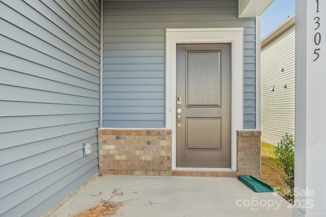 1305 31st St NE, Conover, NC 28613 - property entrance featuring brick siding