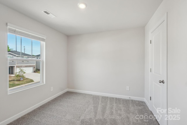 1305 31st St NE, Conover, NC 28613 - carpeted spare room with baseboards, visible vents, and recessed lighting