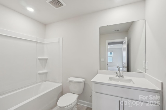 1305 31st St NE, Conover, NC 28613 - bathroom featuring toilet, visible vents, vanity, and shower / bathtub combination