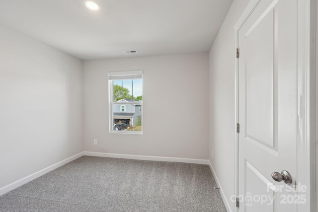 1305 31st St NE, Conover, NC 28613 - empty room with baseboards, recessed lighting, carpet flooring, and visible vents