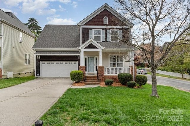 10802 Tradition View Dr, Charlotte, NC 28269 - craftsman house featuring driveway, a porch, and a front yard