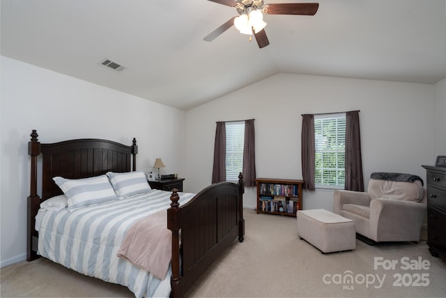 carpeted bedroom with visible vents, ceiling fan, baseboards, and lofted ceiling