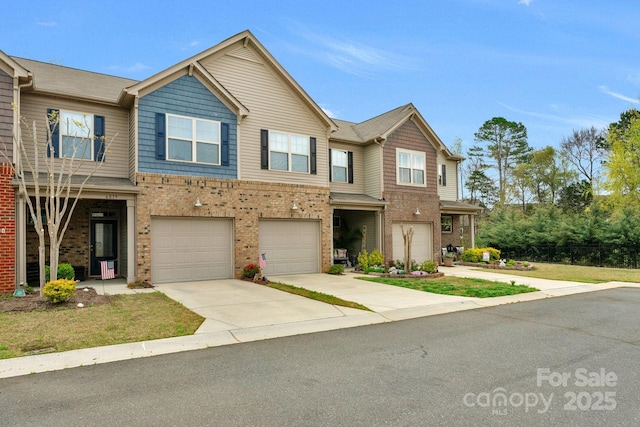 6021 Sweetbay Ln, Indian Land, SC 29707 - view of property featuring brick siding, a garage, and concrete driveway