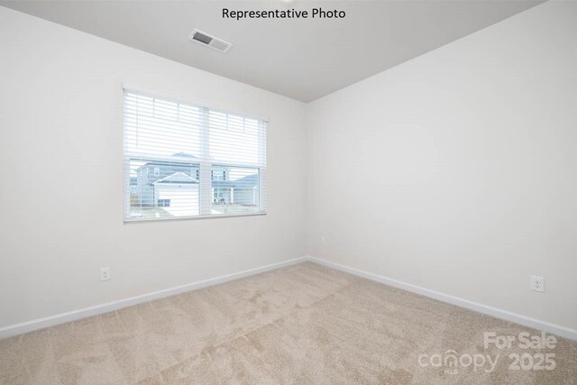 2315 Riggs Rd, Sherrills Ford, NC 28673 - carpeted empty room featuring visible vents and baseboards