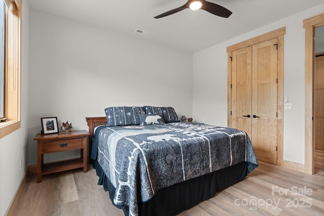 192 Lakeview Trl, Bryson City, NC 28713 - bedroom featuring wood finished floors, baseboards, and ceiling fan