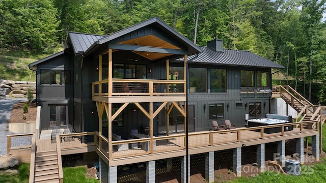 192 Lakeview Trl, Bryson City, NC 28713 - back of property with stairs, a standing seam roof, and board and batten siding