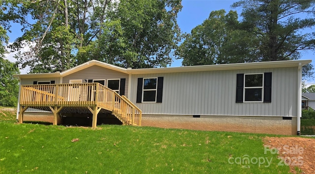 28 Mcgee Hill Rd, Fairview, NC 28730 - rear view of property with crawl space, a deck, and a lawn