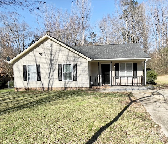218 Cottonwood Park Dr, Charlotte, NC 28214 - ranch-style house with a porch, a front lawn, and roof with shingles