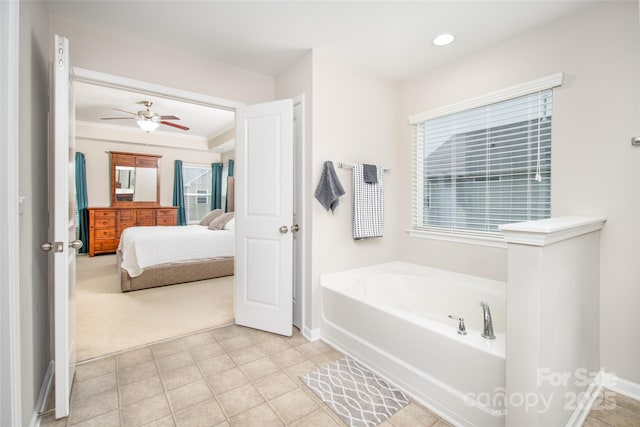 128 Millen Dr, Mooresville, NC 28115 - full bath featuring a bath, connected bathroom, and a ceiling fan