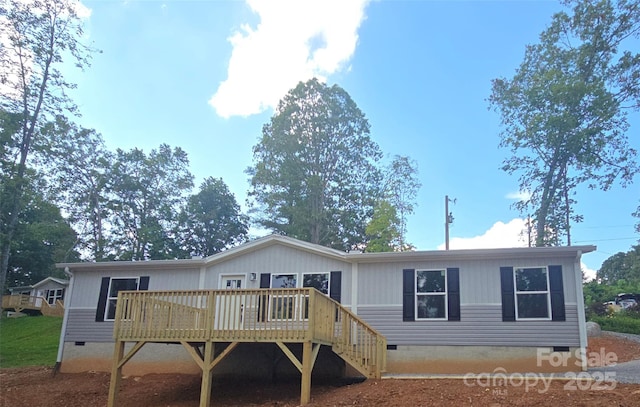 22 Mcgee Hill Rd, Fairview, NC 28730 - back of property with crawl space and a deck