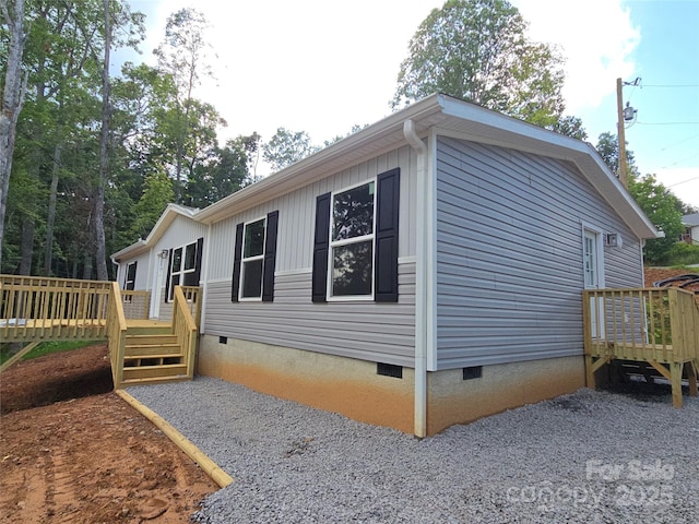 22 Mcgee Hill Rd, Fairview, NC 28730 - view of home's exterior featuring crawl space and a wooden deck