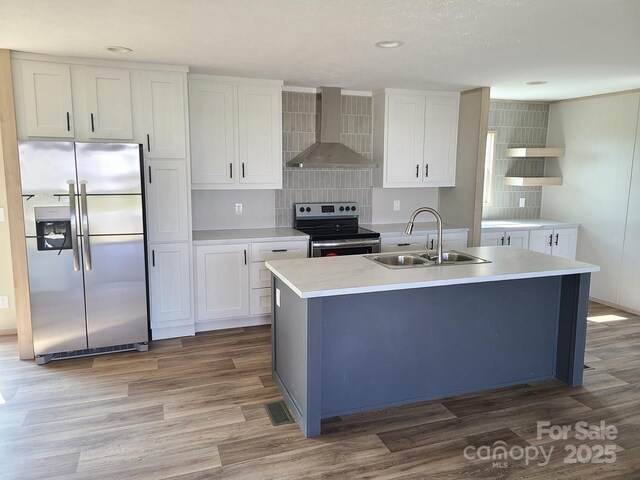 22 Mcgee Hill Rd, Fairview, NC 28730 - kitchen featuring stainless steel appliances, wall chimney exhaust hood, backsplash, white cabinets, and recessed lighting