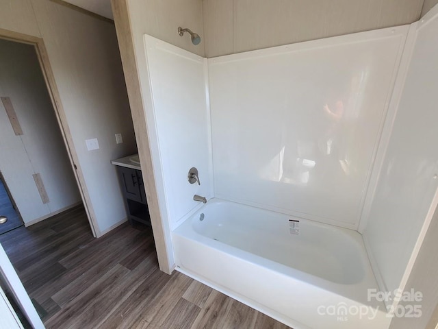 22 Mcgee Hill Rd, Fairview, NC 28730 - full bathroom with wood finished floors, vanity, and bathtub / shower combination