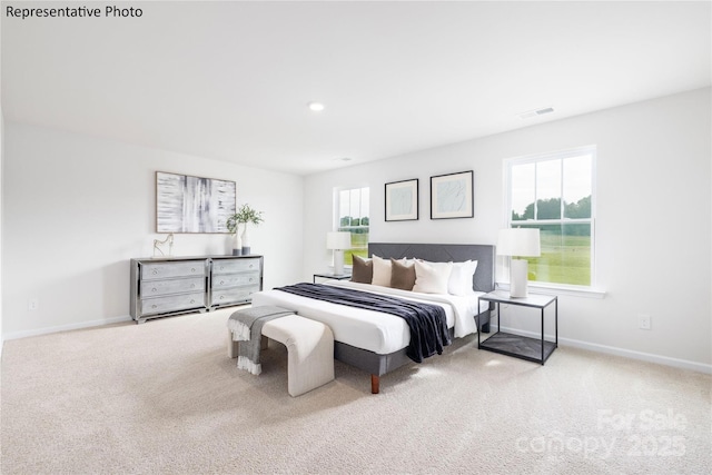 bedroom featuring carpet, visible vents, and baseboards