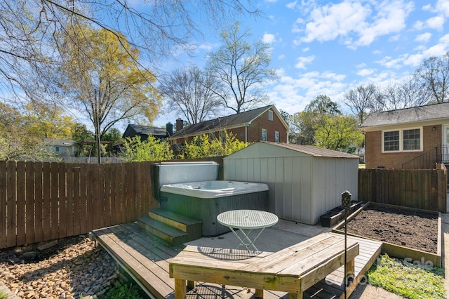 3808 Severn Ave, Charlotte, NC 28210 - deck with an outdoor structure, a fenced backyard, a hot tub, and a storage shed