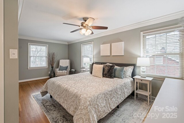 3808 Severn Ave, Charlotte, NC 28210 - bedroom featuring crown molding, baseboards, ceiling fan, and wood finished floors