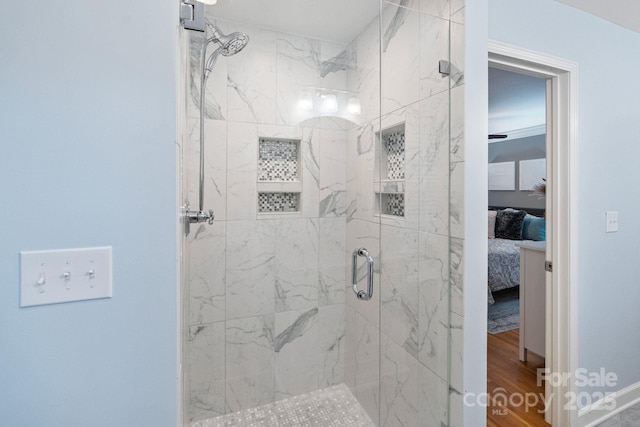 3808 Severn Ave, Charlotte, NC 28210 - full bath with a marble finish shower, ensuite bathroom, and wood finished floors