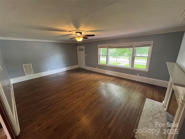 603 E Main St, Rock Hill, SC 29730 - unfurnished living room featuring ornamental molding, dark wood finished floors, ceiling fan, and a fireplace