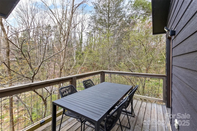 deck featuring outdoor dining space