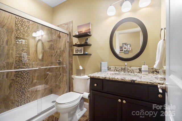 226 Hermance Ln, Mooresville, NC 28117 - bathroom with toilet, vanity, and a stall shower