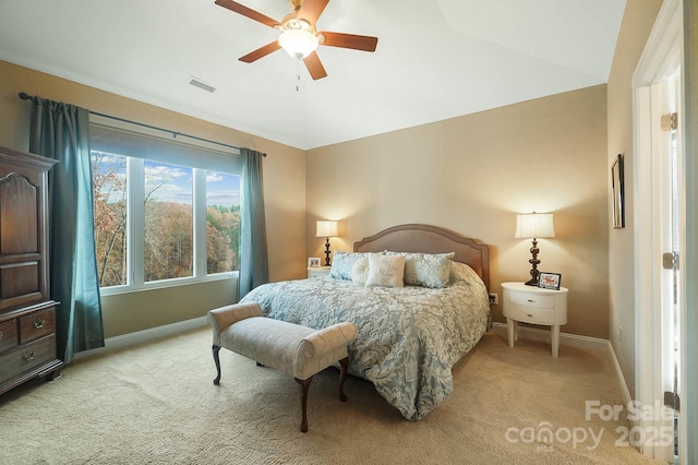 226 Hermance Ln, Mooresville, NC 28117 - bedroom featuring baseboards, light carpet, lofted ceiling, and ceiling fan