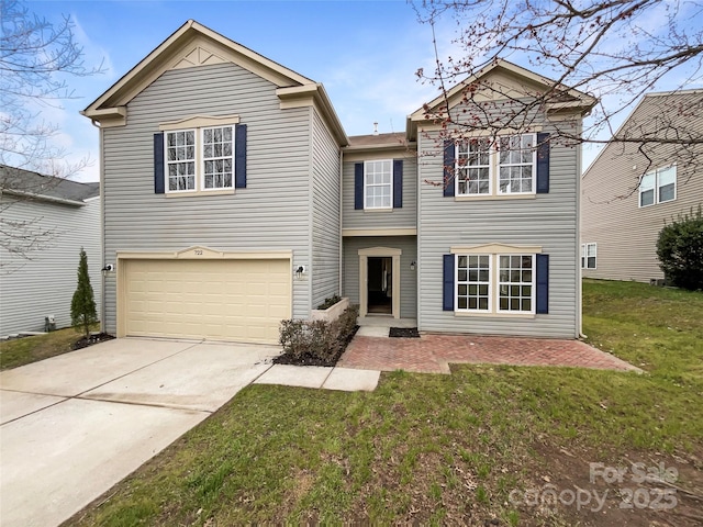 traditional-style home with driveway, a front lawn, and a garage