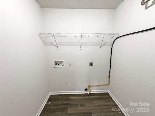 laundry room featuring wood finished floors, baseboards, gas dryer hookup, hookup for a washing machine, and laundry area