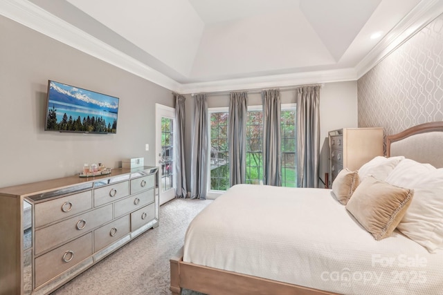 bedroom with access to outside, wallpapered walls, light colored carpet, and multiple windows