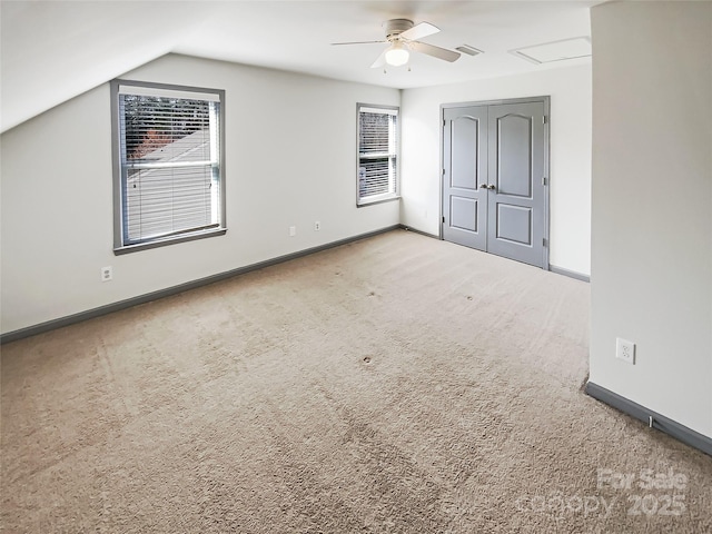 5006 Brodie Ln, Fort Mill, SC 29707 - unfurnished bedroom with baseboards, a ceiling fan, lofted ceiling, and carpet flooring