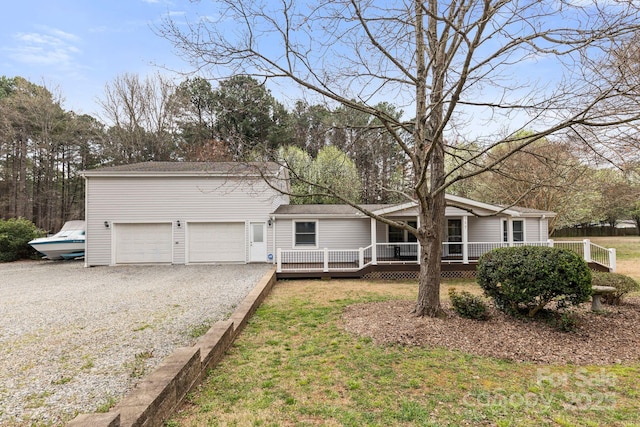 117 Pine Bluff Dr, Mooresville, NC 28117 - view of front facade featuring a front yard, a garage, and driveway