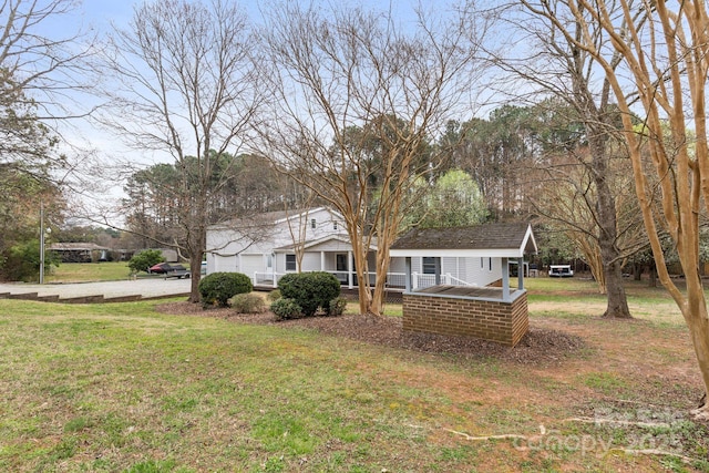 117 Pine Bluff Dr, Mooresville, NC 28117 - view of front of house with a garage, driveway, and a front lawn
