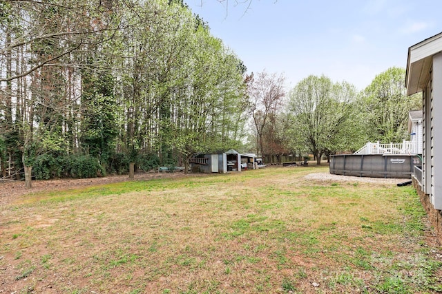 117 Pine Bluff Dr, Mooresville, NC 28117 - view of yard featuring an outdoor pool and an outdoor structure