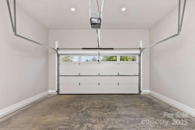 garage with recessed lighting, baseboards, and a garage door opener