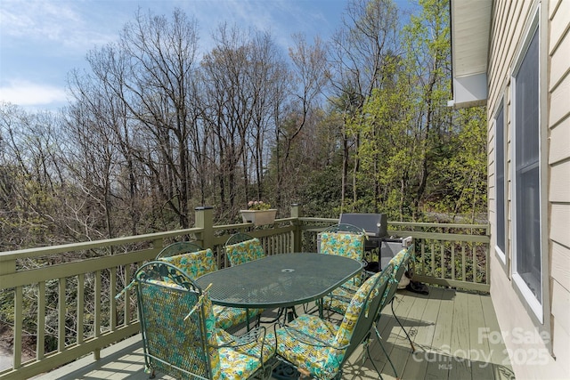 172 Sunny Ridge Rd, Hendersonville, NC 28739 - wooden terrace with outdoor dining area